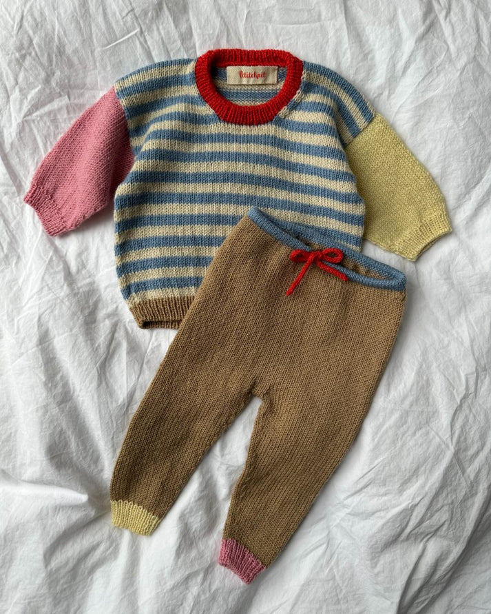 Holger Baby Set on suloinen, iloisen värikäs ja leikkisä vauvojen ja taaperoiden asukokonaisuus
