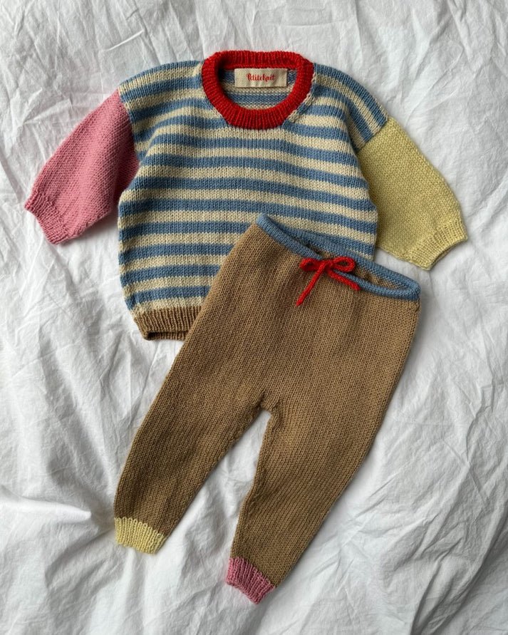 Holger Baby Set on suloinen, iloisen värikäs ja leikkisä vauvojen ja taaperoiden asukokonaisuus
