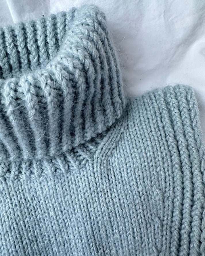 Terrazzo Neck Junior on lapsille ja nuorille suunniteltu lämmin, käytännöllinen ja moderni poolokauluri.