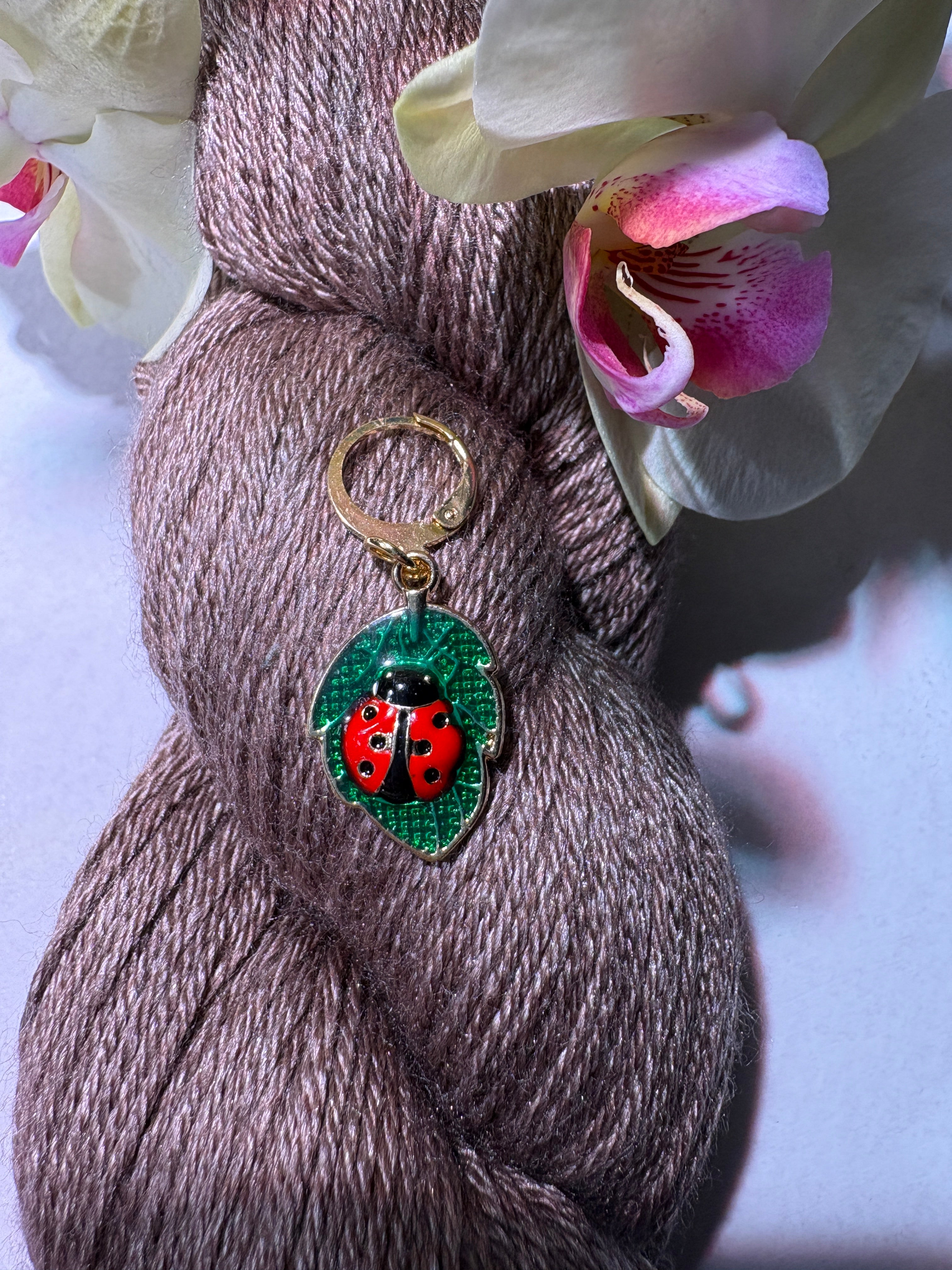 Onnentuoja - silmukkamerkki