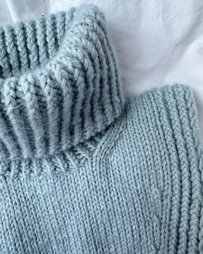 Terrazzo Neck Junior on lapsille ja nuorille suunniteltu lämmin, käytännöllinen ja moderni poolokauluri.